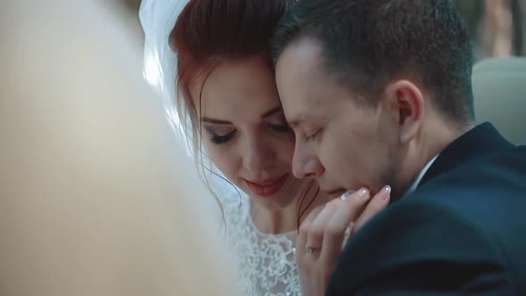 Newlyweds Sitting Car Convertible, Look at Each Other, Interact, Close-up, Slow Motion