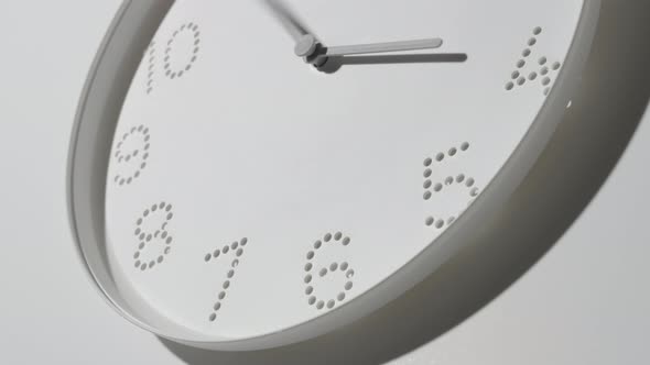 Dotted White Clock Face on Wall All Day