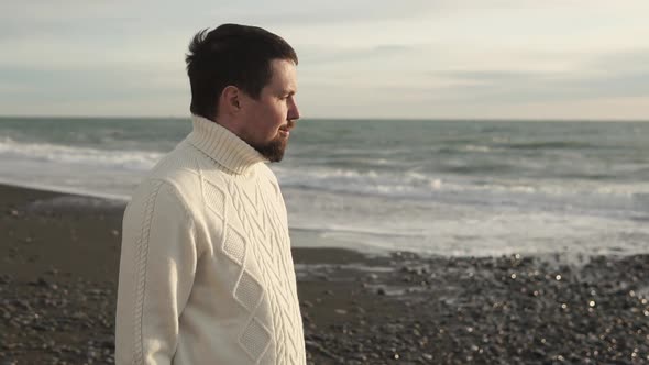 a Young Man Looks with Pleasure on a Seascape, He Stands By the Sea