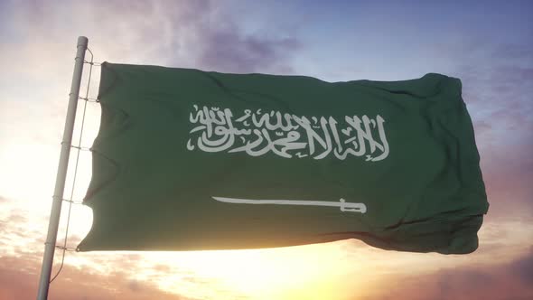 Flag of Saudi Arabia Waving in the Wind Against Deep Beautiful Sky at Sunset