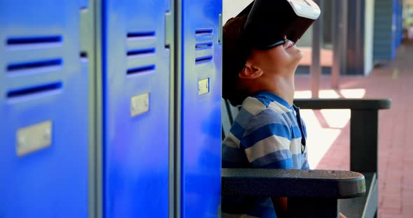 Schoolboy using virtual reality headset 4k