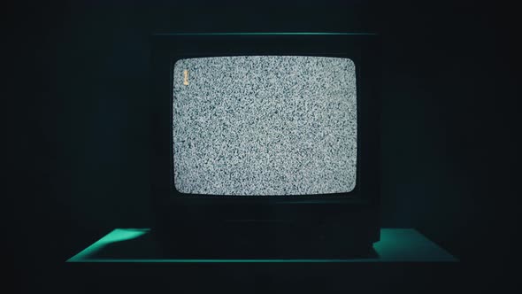 Vintage Television with Bad Signal in the Night