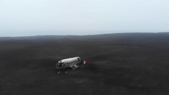 a plane that crashed on black sand