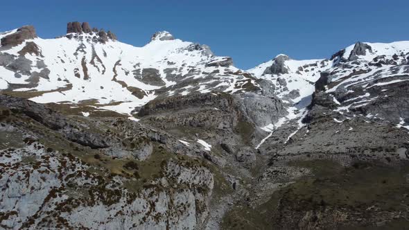 Mountain summits and valley with snow during winter