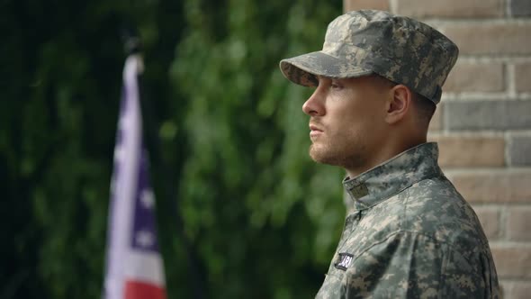 Pensive American Military Man Looking at Rain, Suffering Depression and Ptsd