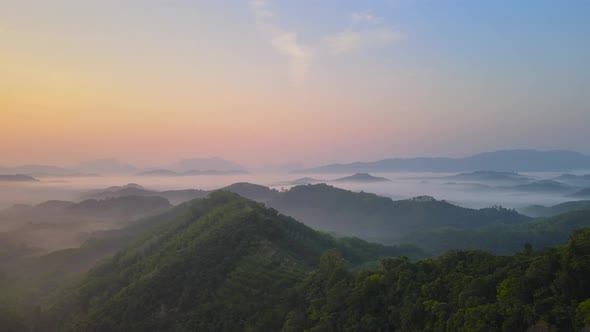 Aerial view video nature morning time and sea of fog mountain