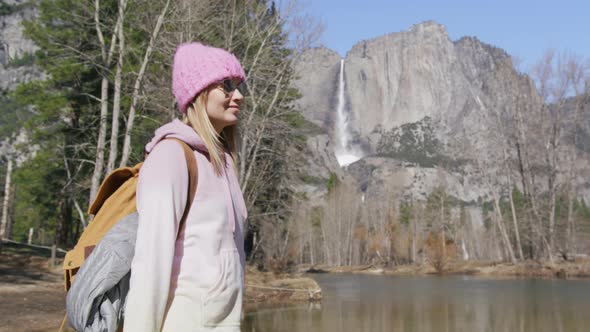 Slow Motion Relaxed Woman Enjoying Yosemite Valley with Waterfall Merced River