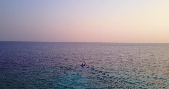 Natural birds eye abstract shot of a white paradise beach and aqua turquoise water background in col