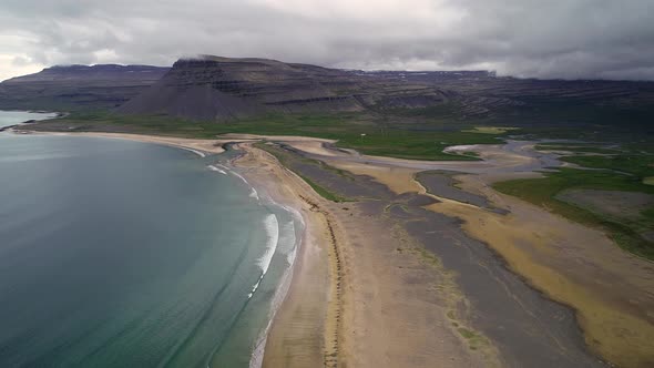 Aerial view of empty beach during a cloudy day, Westfjords Region, Iceland.