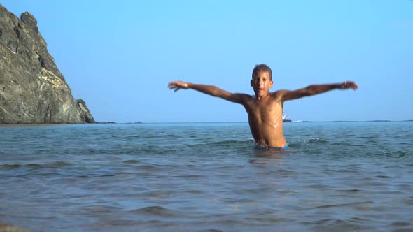 The Child Bathes and Plays in the Sea