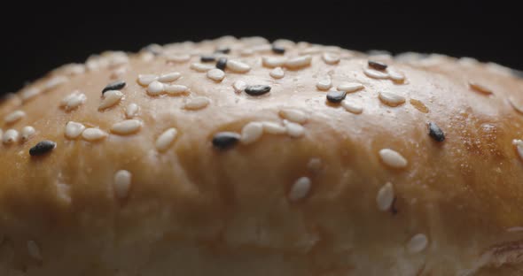 Burger close-up rotating in studio. Tasty fast food.