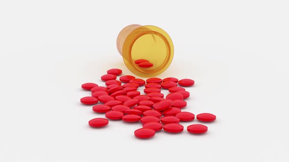 Red Round Pills Scattered on the Table From a Yellow Jar