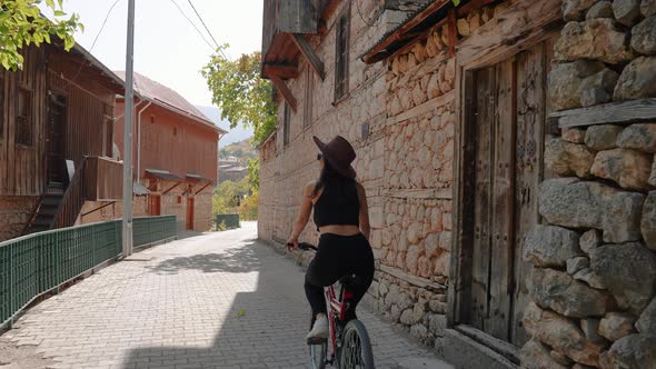 Tourist Biking on the Street