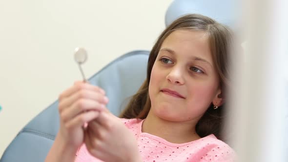 Close up of cute girl having a dental checkup