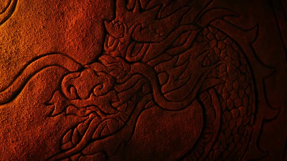 Firelight Flickers On Dragon Stone Carving