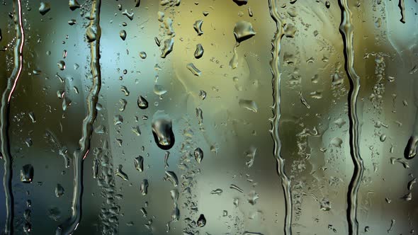 Abstract Background with View Through Cafe Window in Rainy Day on City Street