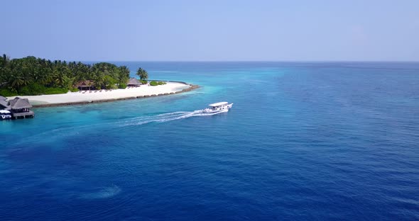 Beautiful drone abstract view of a summer white paradise sand beach and aqua turquoise water backgro