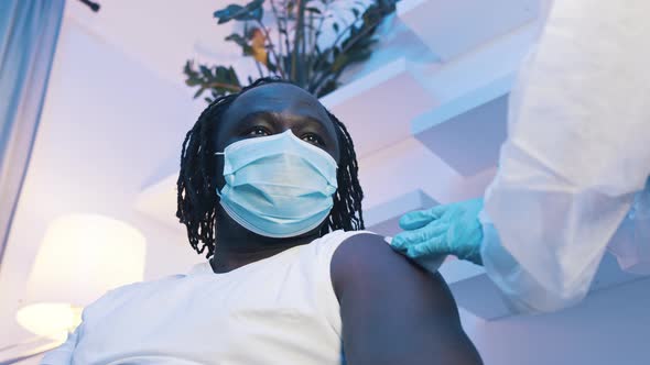 Black Man Receiving Vaccine Against Covid19