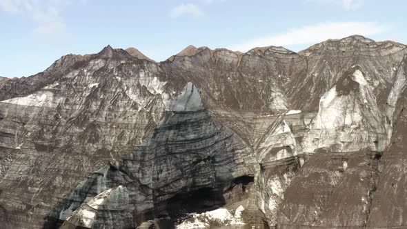 Rocky Ice Cave Of Subglacial Katla Volcano In Southern Iceland. drone approach