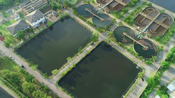 Aerial view top down of wastewater treatment plant with round ponds for recycle dirty sewage water