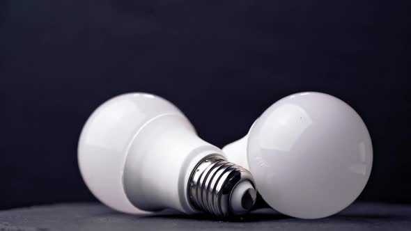 LED light bulbs on table with dark background