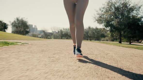 Closeup of Active Woman Legs Running Outdoor