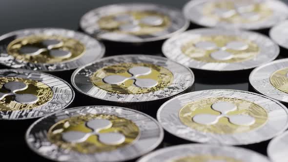 Rotating shot of Bitcoins (digital cryptocurrency) - BITCOIN RIPPLE