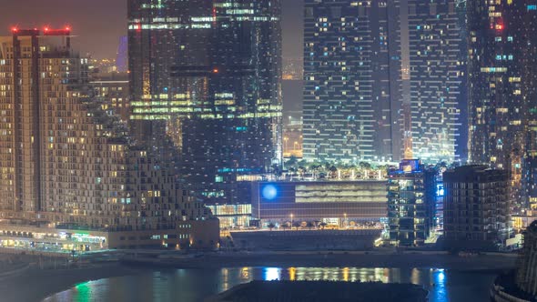 Buildings on Al Reem Island in Abu Dhabi Night Timelapse From Above