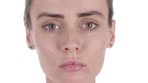 Close Up of Serious Middle Aged Woman Face White Background