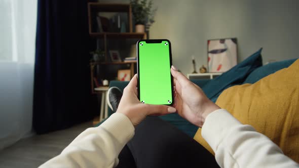 Woman Using Smartphone with Green Screen