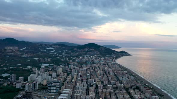 Colorful Sunset Over the City Aerial View 4 K Alanya Turkey