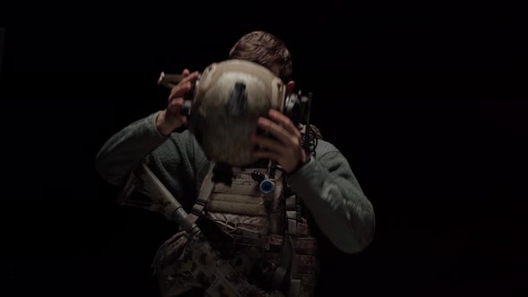 Special Forces US Soldier Puts on His Helmet in the Dark