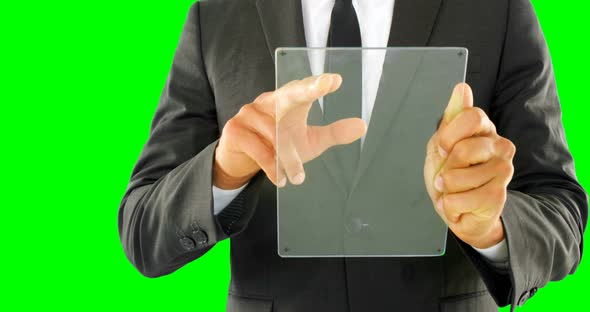 Businessman using glass digital tablet 4k