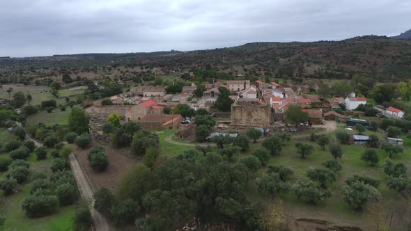 Drone aerial view of Idanha a velha historic village and landscape with Monsanto on the background,