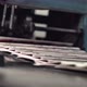 Printed Newspapers are Moved Along Conveyor - VideoHive Item for Sale