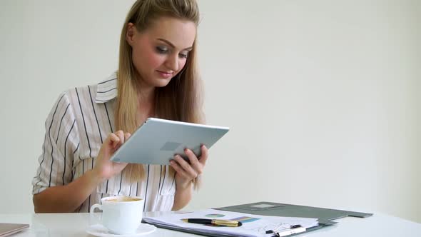 Blonde Business Woman Working at Modern Office