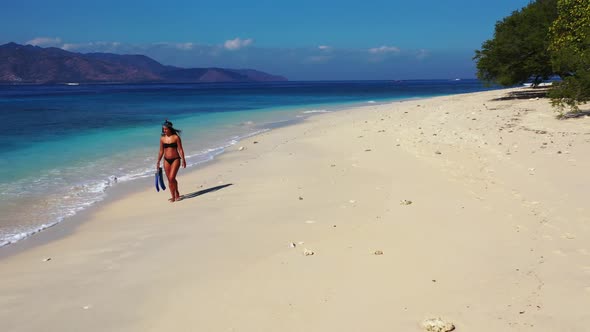 Ladies happy together on tranquil sea view beach adventure by aqua blue lagoon with clean sand backg