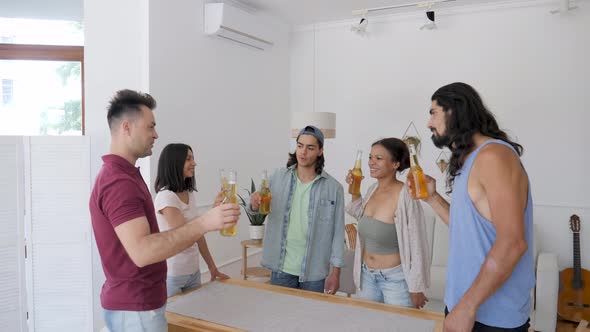 Friends Clink Beer Bottles