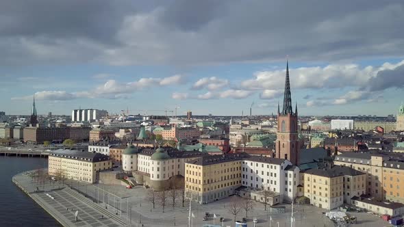 Pull Out to Reveal Old City. Aerial shot of Riddarholmen Church, Stockholm, Sweden