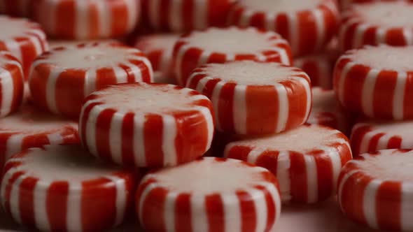 Rotating shot of peppermint candies - CANDY PEPPERMINT 070