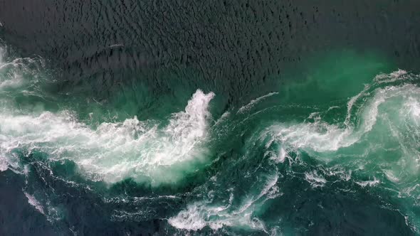 Waves of Water of the River and the Sea Meet Each Other