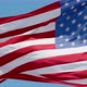 American flag waving in the wind on blue sky - VideoHive Item for Sale