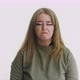 Upset Woman with Funny Grimace Looks Into Camera on White - VideoHive Item for Sale