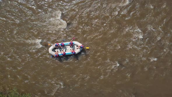 Top View of People Rafting on Mountain River