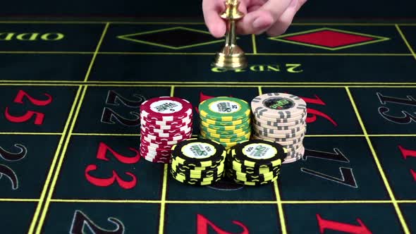 Poker Chips on Gaming Table, Winning Chip, Black, Slow Motion