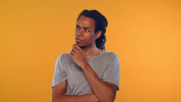 Portrait of Serious Dark Skinned Thoughtful Male Has Pensive Expression