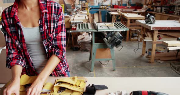 Portrait of attractive carpenter smiling for camera