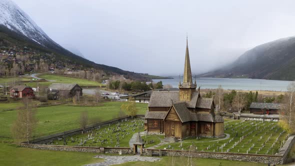 Panoramic View Of Lom Stave Church (Lom Stavkyrkje) And Graveyard In Innlandet County, Oppland, Norw