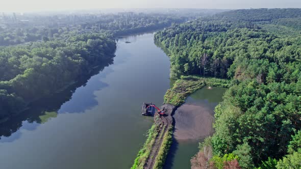 Dredger is Working to Deepen the Fairway on the River