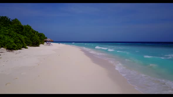 Aerial top view landscape of tropical tourist beach vacation by clear sea and white sand background 